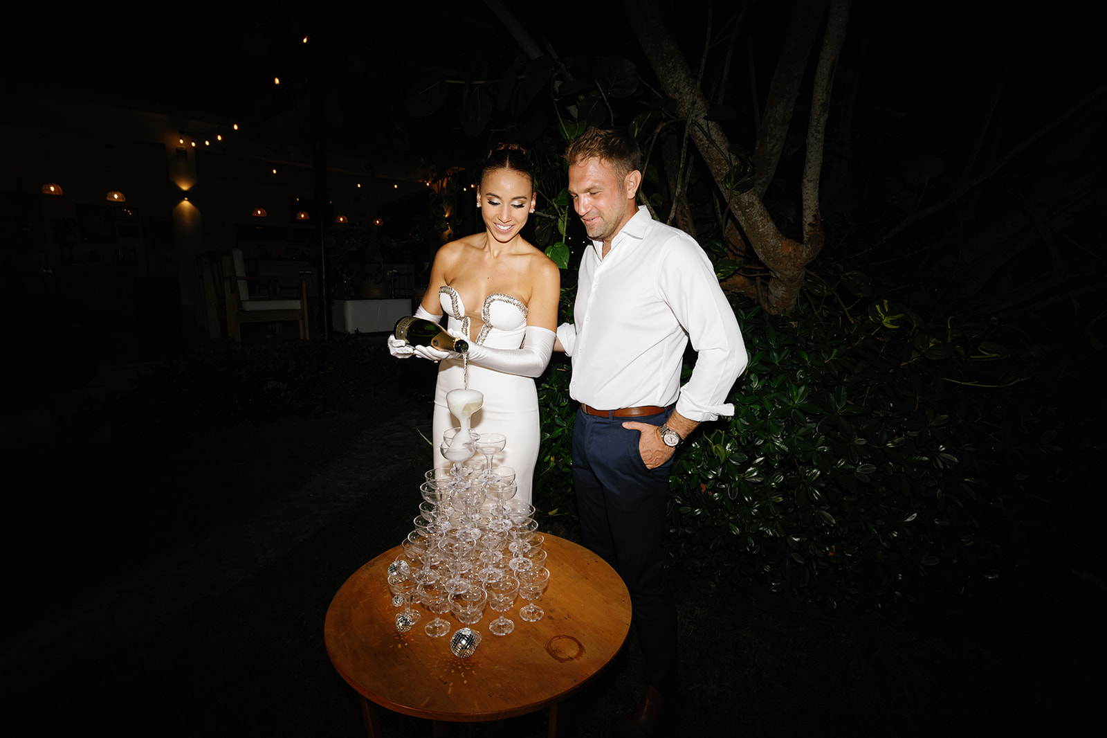 Reception dance floor under string lights, Dominican Republic wedding