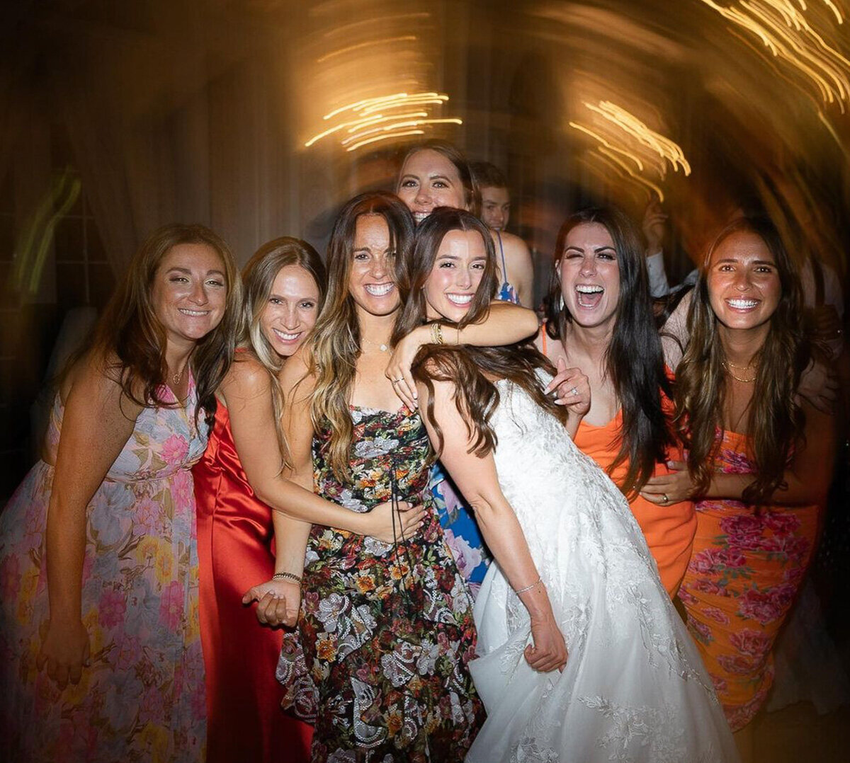Reception group moment captured on the dance floor