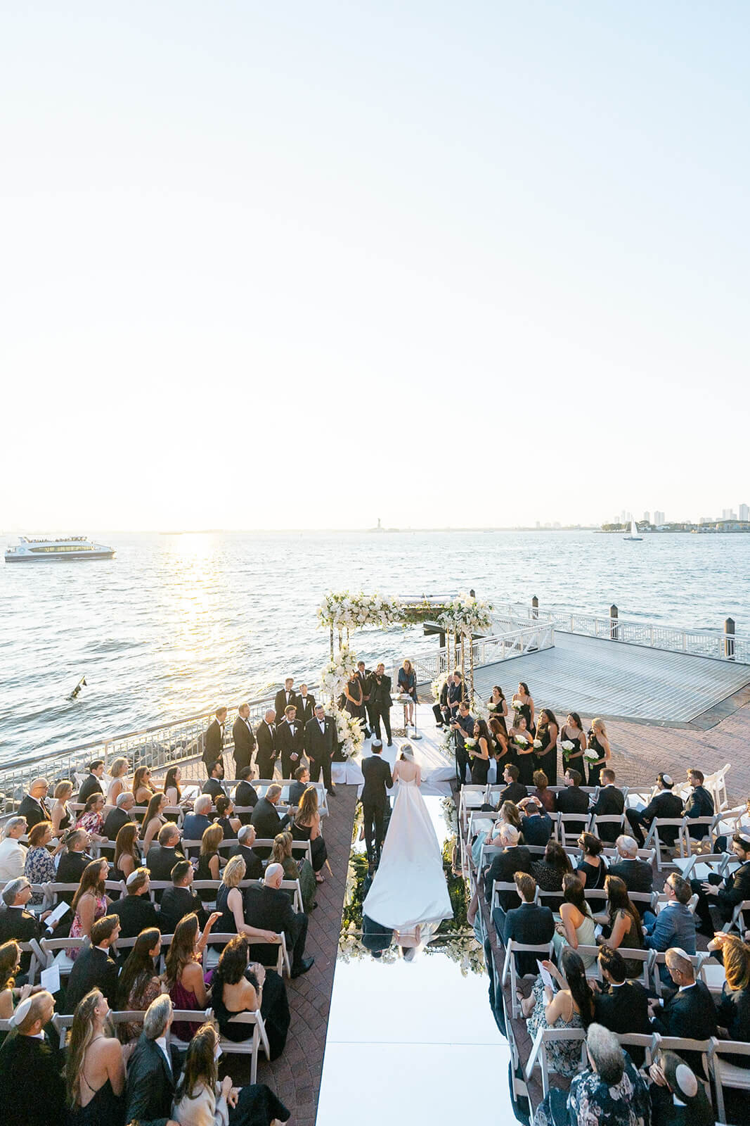 Waterside wedding ceremony filmed by Motion of Time