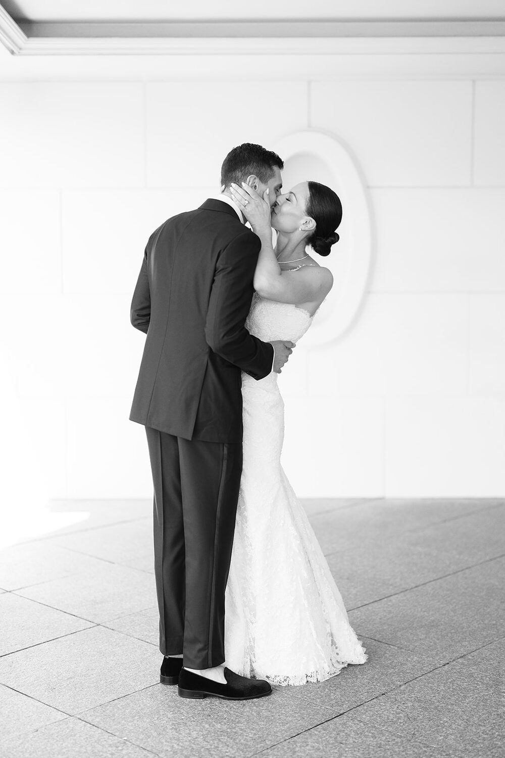 Wedding at Glen Island Harbour Club — black and white kiss marble hallway