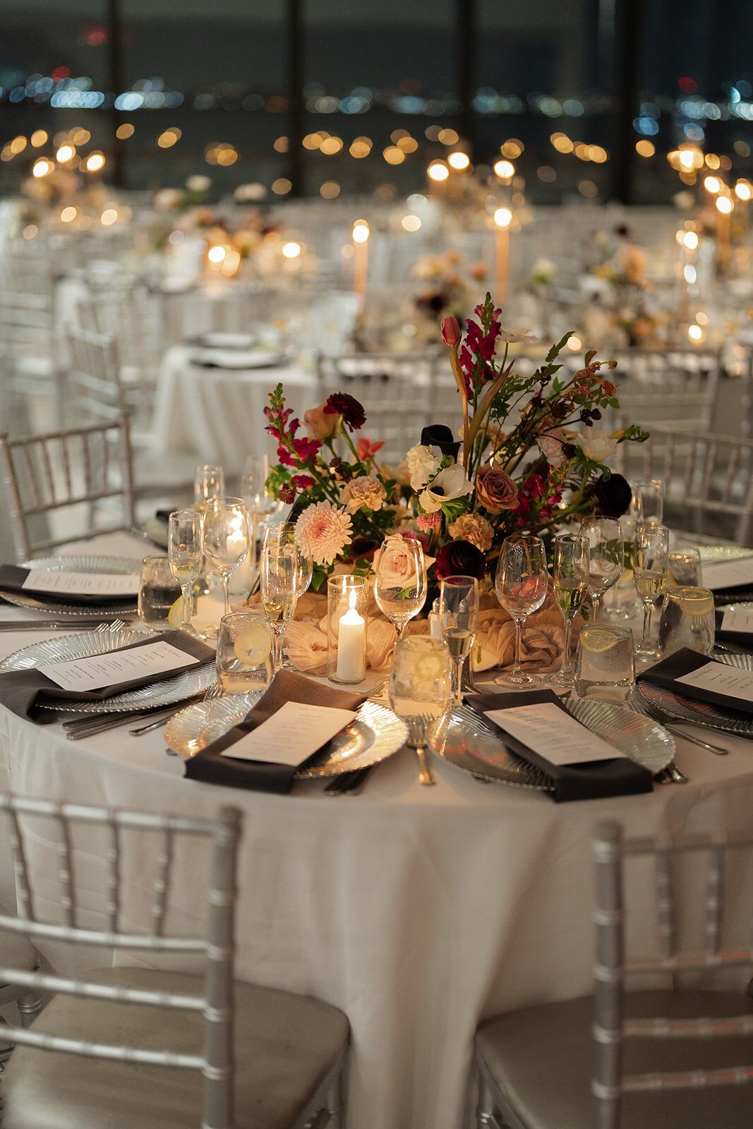 Reception tables in candlelight at Hudson House