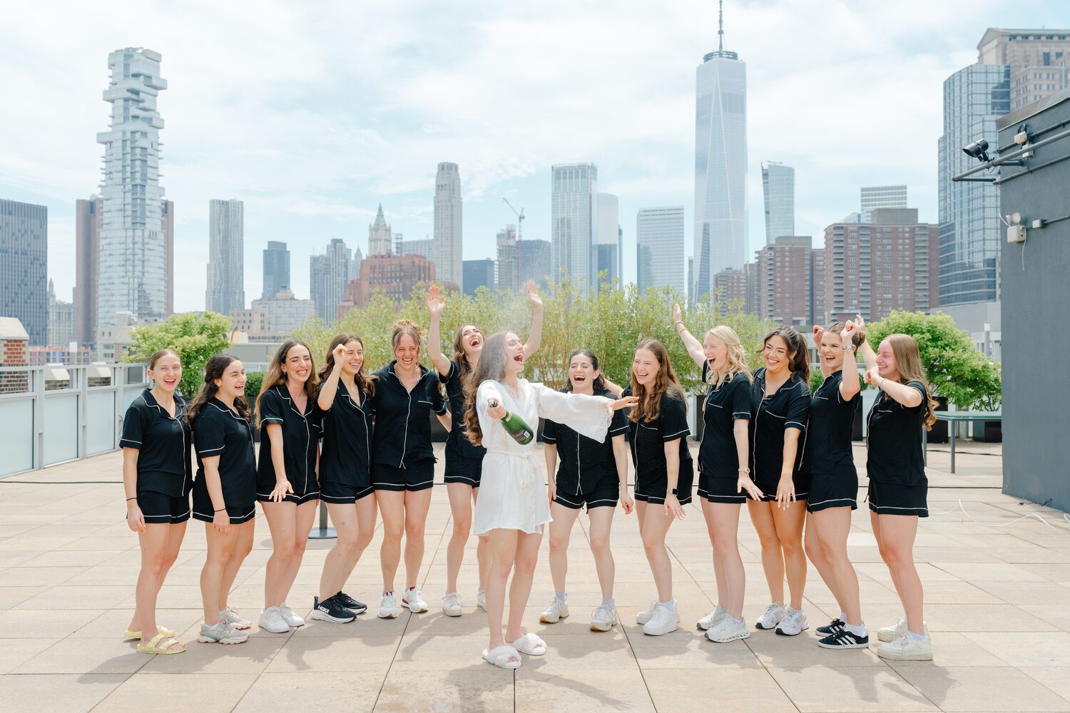 Wedding at Tribeca Rooftop + 360° — bridesmaids rooftop terrace manhattan skyline